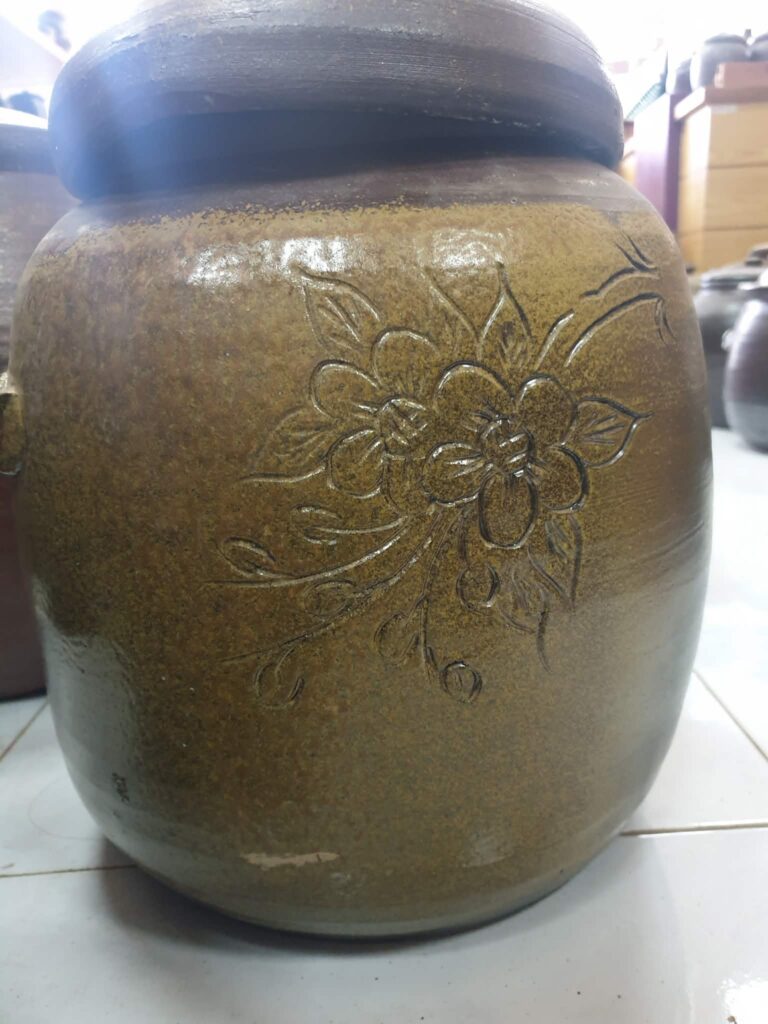 GỐM SÀNH - TRỞ VỀ VỚI ĐẤT MẸ Hũ sành tròn dáng thon dung tích 12 lít lỗi 650k còn 600k