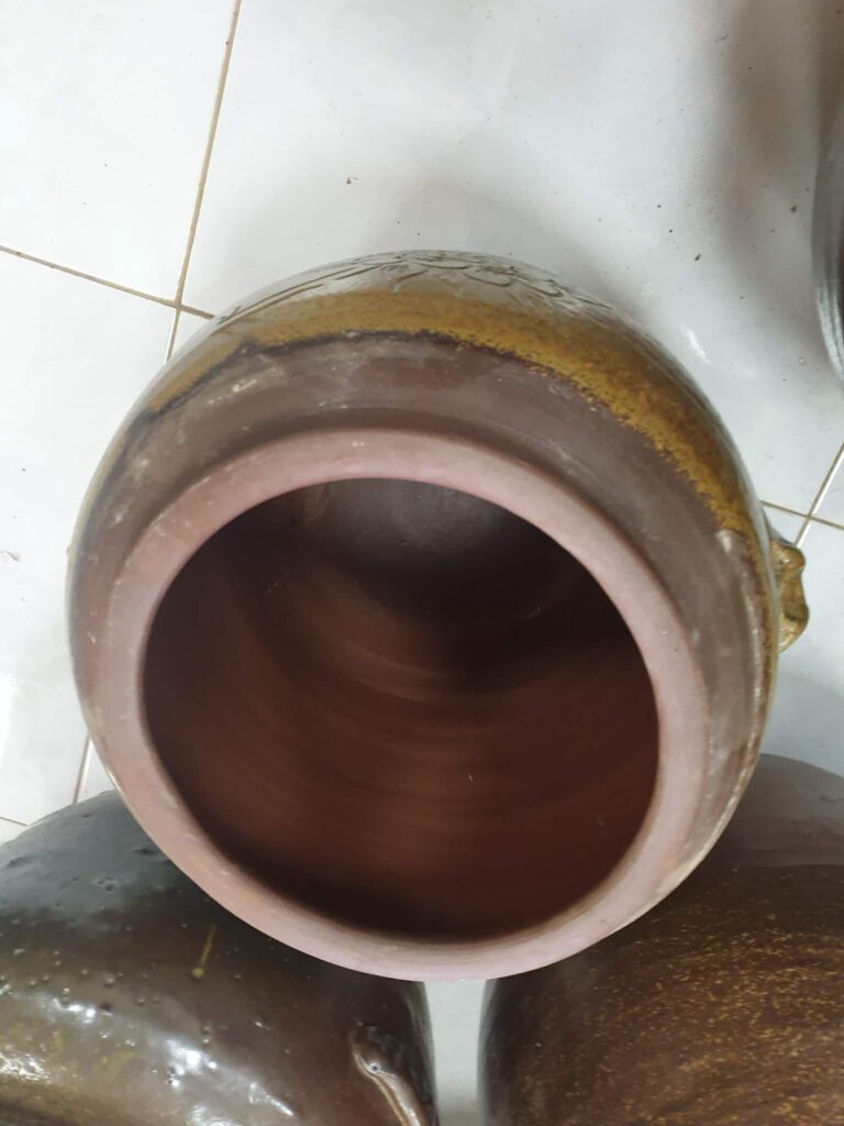 GỐM SÀNH - TRỞ VỀ VỚI ĐẤT MẸ Hũ sành tròn dáng thon dung tích 12 lít lỗi 650k còn 600k